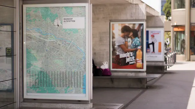 advertisement, billboard, outside, poster, train station, gray train, billboard, billboard, billboard, billboard, billboard, poster. Looker Studio vs Power BI: Which Marketing Dashboard Template to Use in the US?