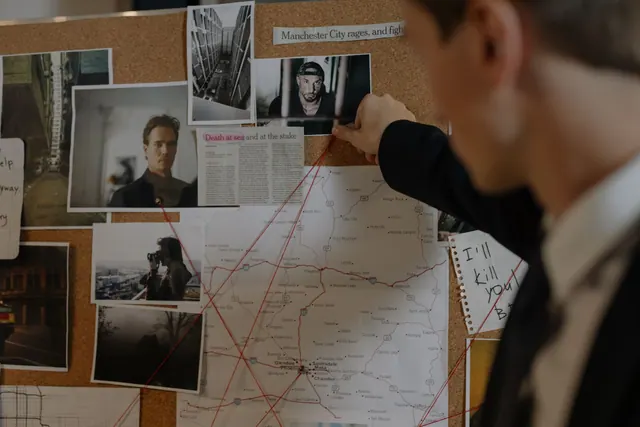 Detective examining a crime investigation board with photos, maps, and notes indoors. What Makes Marketing Case Studies Credible