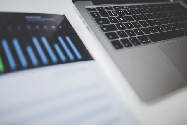 macbook, laptop, computer, technology, charts, graphs, marketing, business, office, desk, gray computer, gray office, gray laptop, gray marketing, gray desk, marketing, marketing, marketing, marketing, marketing. Marketing report template formats: CSV, spreadsheet, PDF or BI